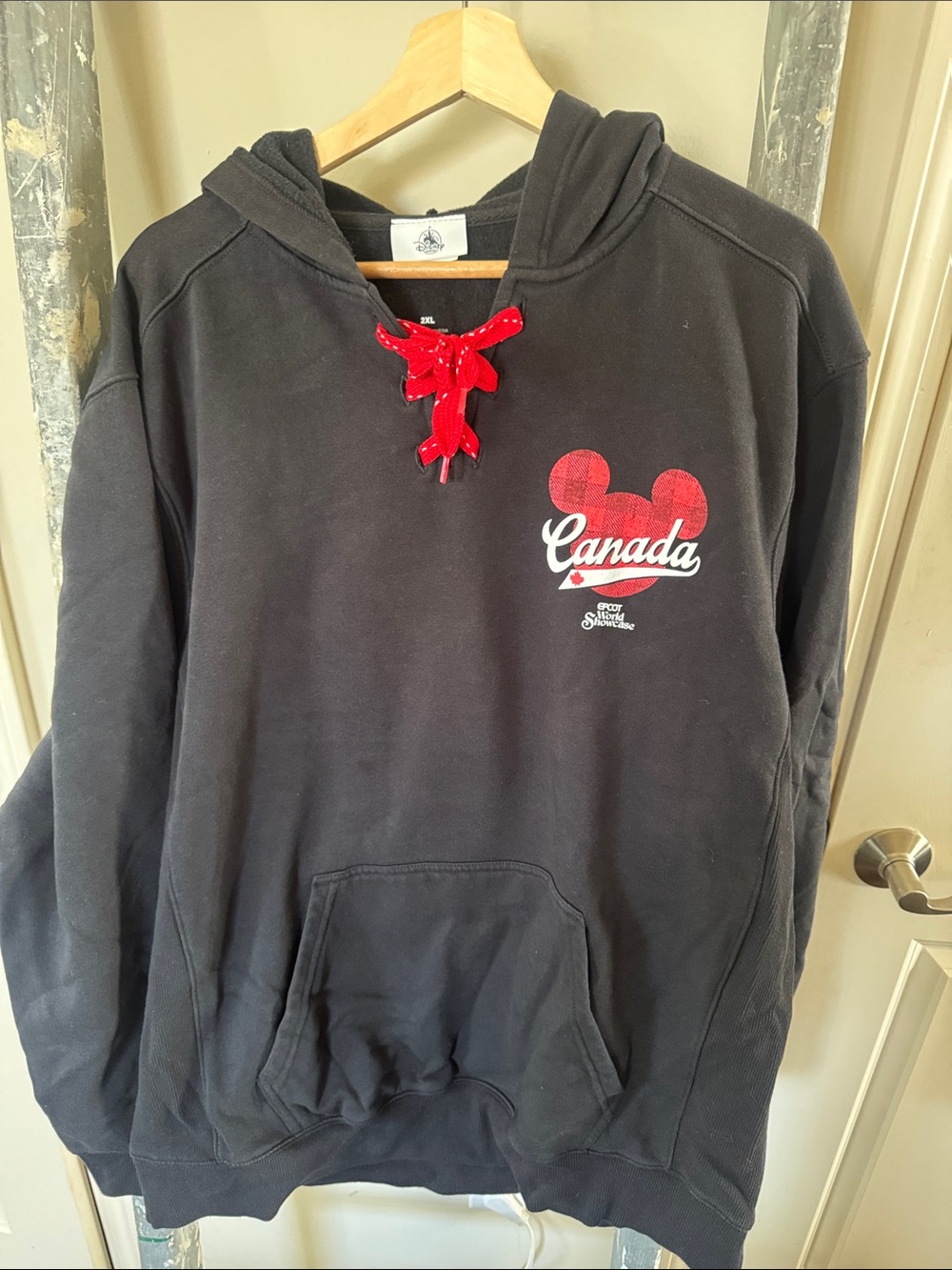 Disney Black Hoodie with Red Canada Graphic and Red Drawstring